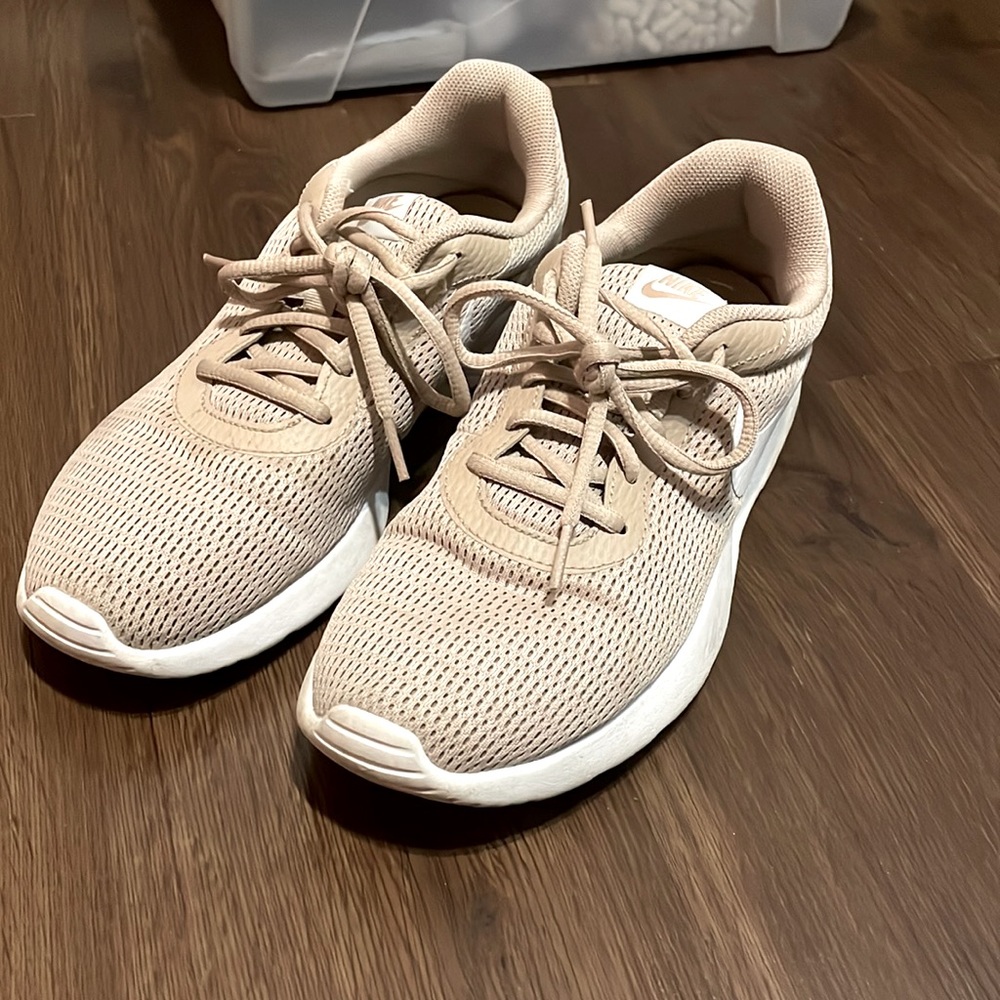 Tan Nike tennis shoes